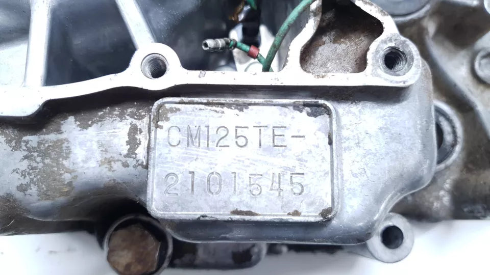 Carter moteur central gauche Honda CM 125 T 1981 Réf : 11200-399-000