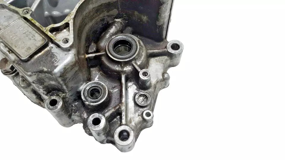 Carter moteur central G Honda CM 125 Custom 1987 Réf : 11200-KC2-000