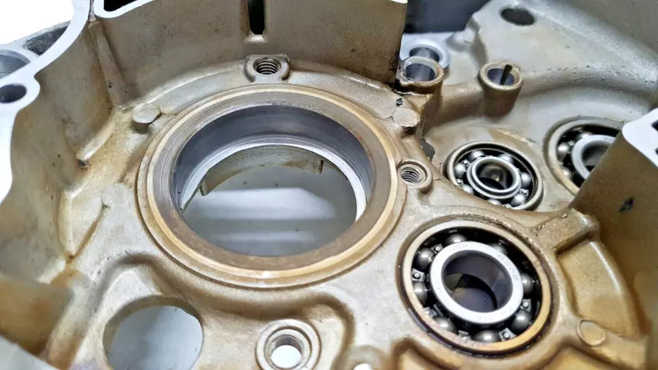 Carter moteur central gauche Yamaha YBR 125 2006 n°3 Réf : 5VL-E5111-10-00