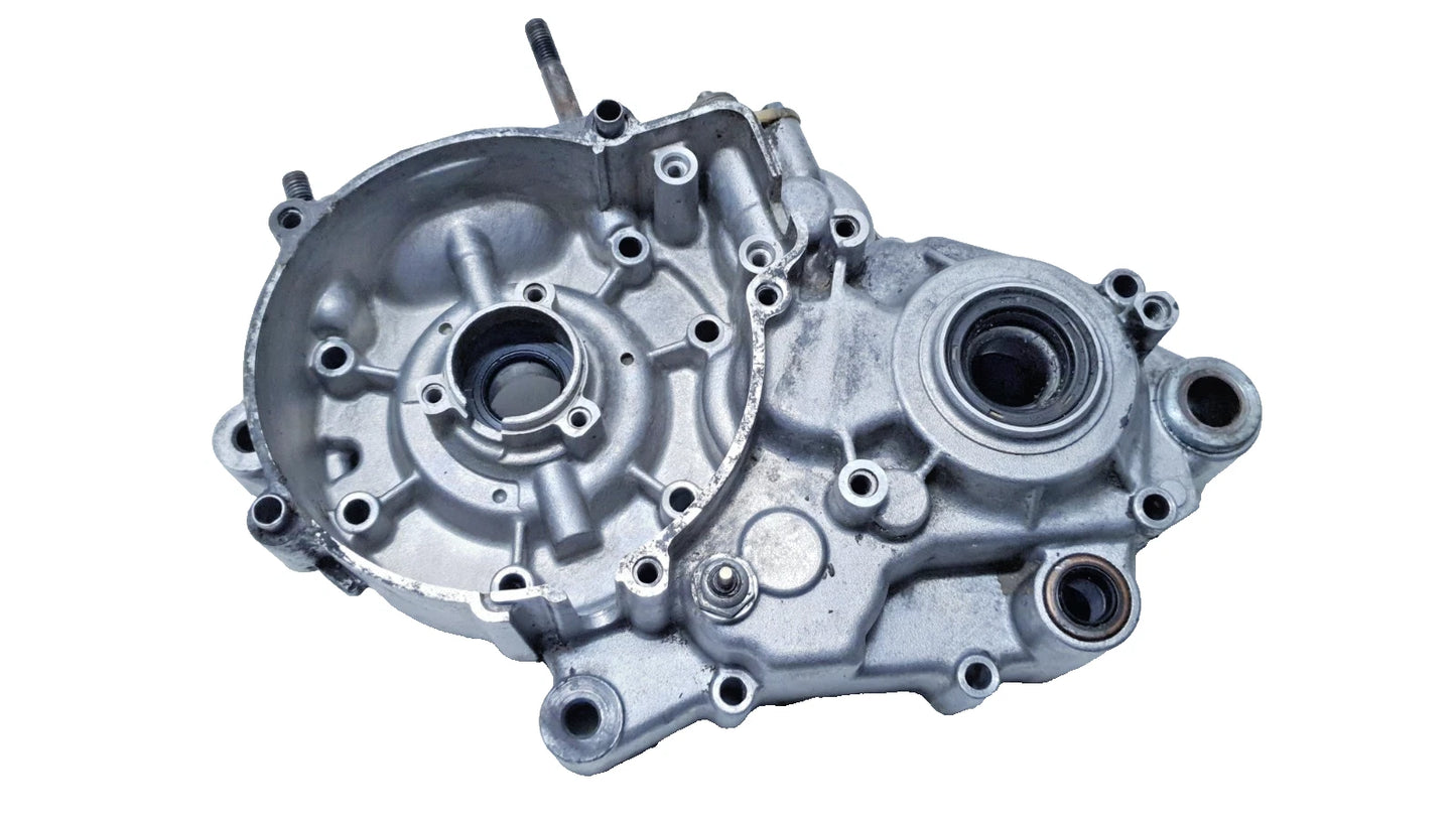 Carter moteur central gauche Kawasaki KMX 125 1986 Réf : 140021405