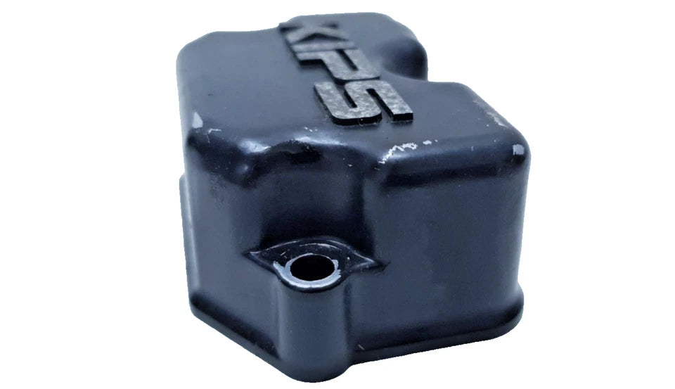 Cache valve gauche Kawasaki KMX 125 1988 Réf : 140901506